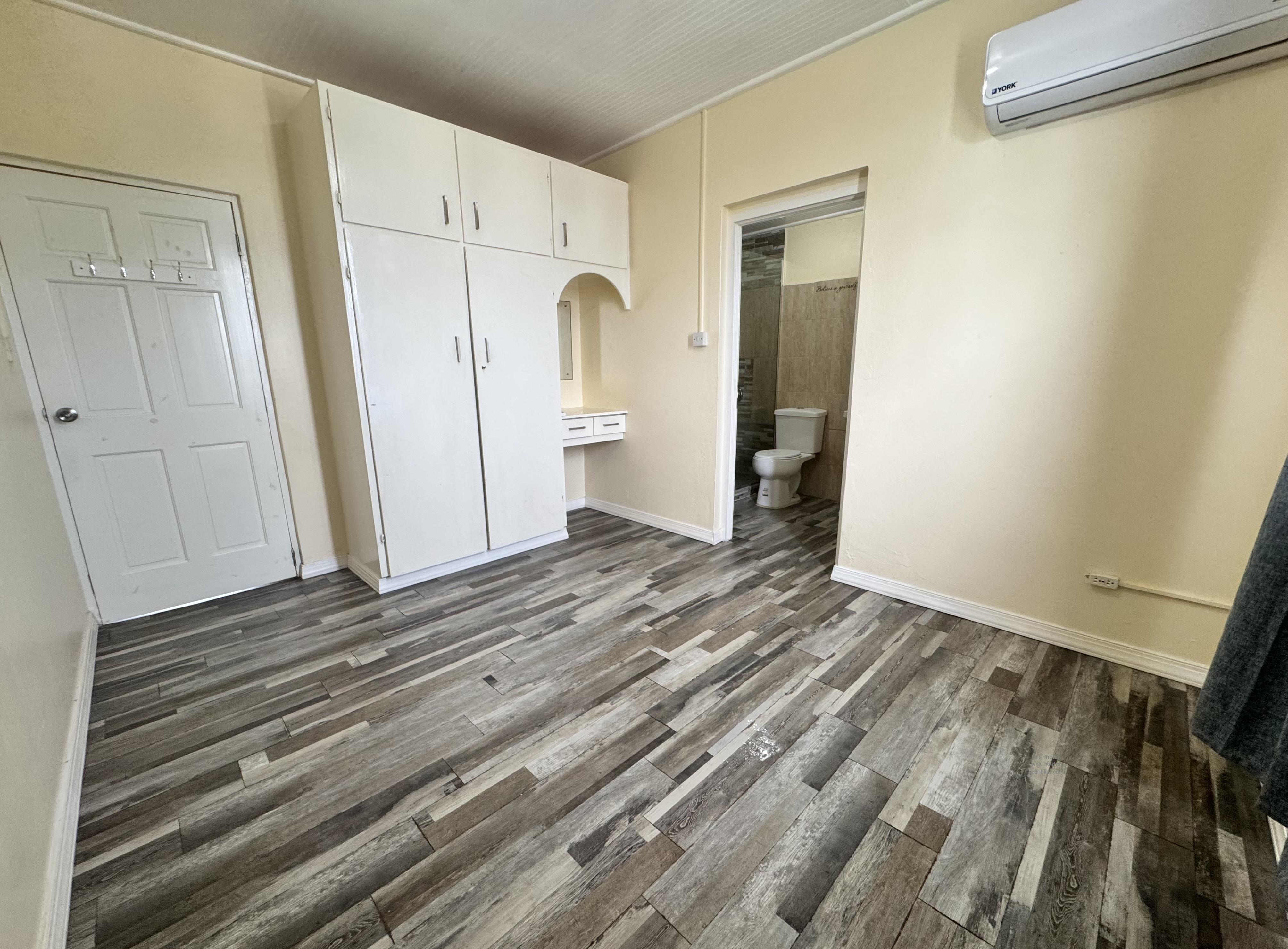 Warrens Terrace - UPSTAIRS/UNFURNISHED/A/c MASTER BEDROOM/ADDITIONAL A/c SPACE/WATER INCLUDED,St. Thomas